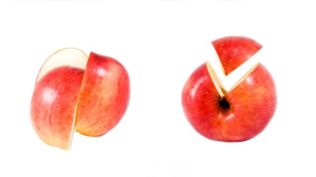 Kuvassa on erikokoisia omenan lohkoja